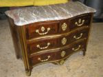 Rosewood and gilded bronze Regence chest of drawers Restoration of a Regence rosewood chest of drawers with brass flutes and gilded bronzes