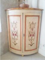 XXth corner cabinet Reattachment of chipped primers, polychromy and lightering of the toning on a XXth corner cabinet