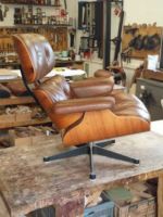 Restoration of the frame and renovation of the leather upholstery on a pair of Eames chairs Restoration of the frame and renovation of the leather upholstery on a pair of Eames chairs